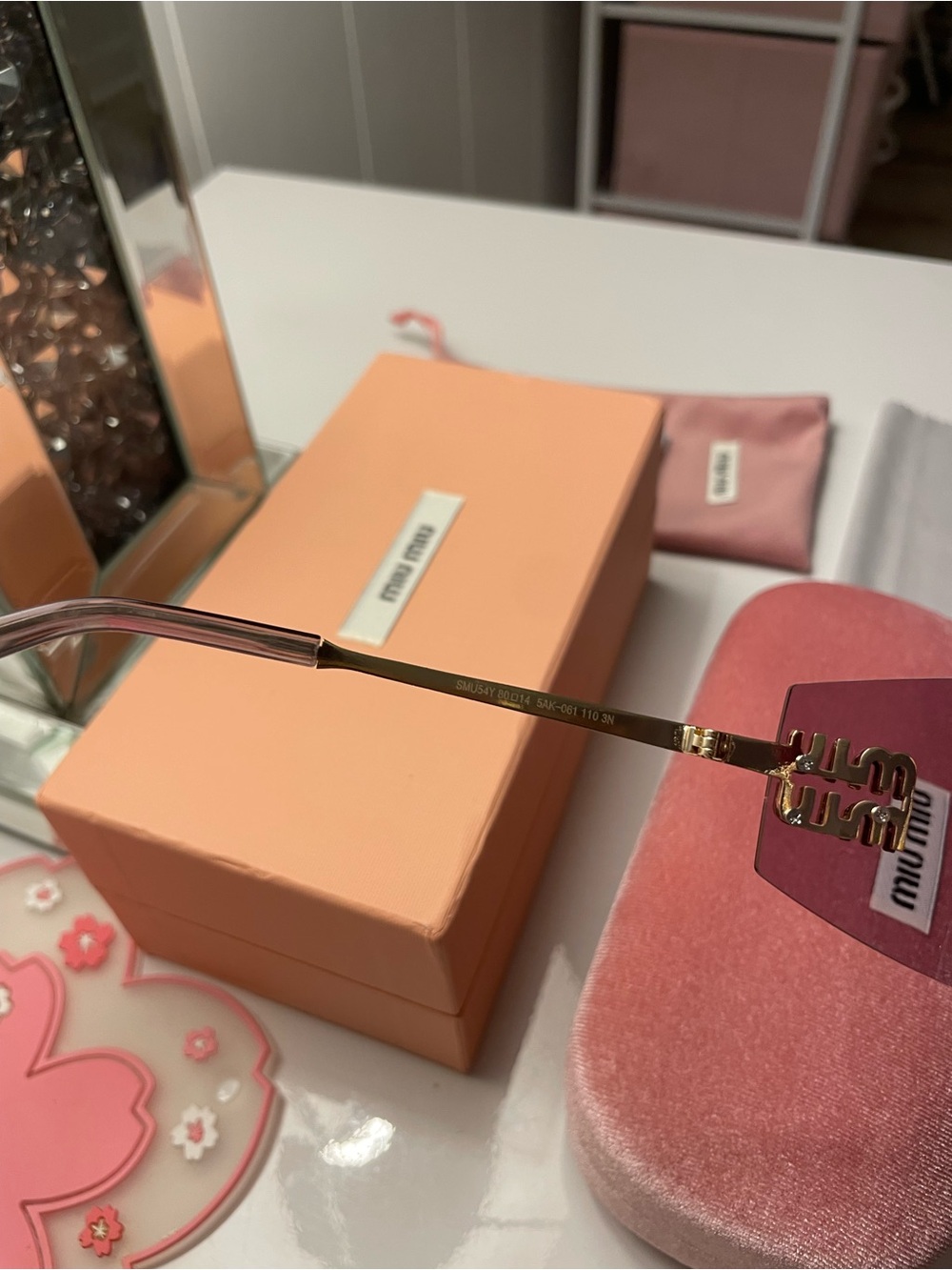 Miu Miu Rimless Rectangular Sunglasses in Rose Pink with Gold Accents - Picture 5 of 5